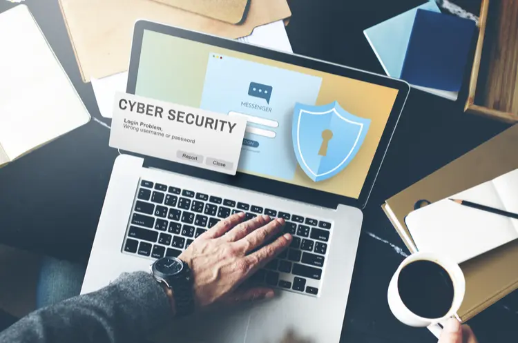 shutterstock_428609689_cybersecurity on laptop